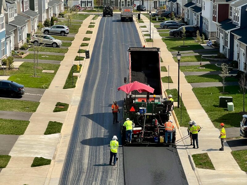 Freshly paved asphalt surface on a commercial property