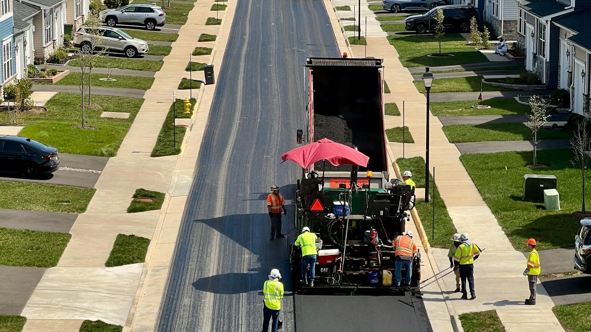 Freshly paved asphalt surface on a commercial property