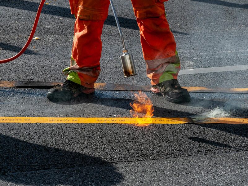 Crack seal repair applied to damaged pavement surface