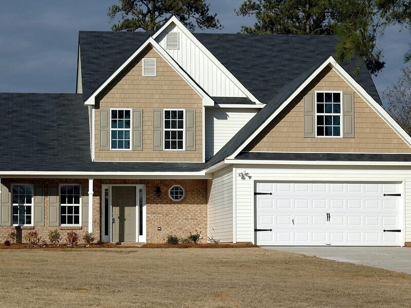Modern casement window installation on a home